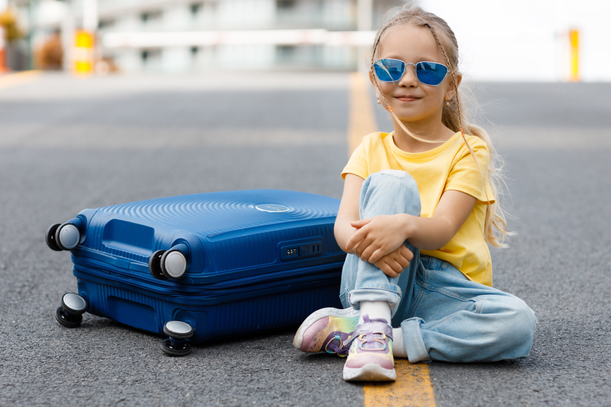 cute-little-girl-with-suitcase-outdoor